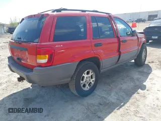 1999 Jeep Grand Cherokee Laredo with VIN 1J4GW58S7XC746609, listed as a IAAI auction lot 42260018 with 254,352 mi miles and . Bid and sale history available at DreamBid. Image 4.