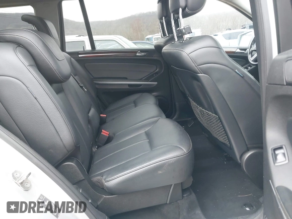 2012 Mercedes-Benz GL 450 z VIN 4JGBF7BE3CA765156, wystawiony jako IAAI lot #42035869 z przebiegiem 208 281 mil mil oraz . Historia ofert i sprzedaży dostępna na DreamBid. Obrazek 8.