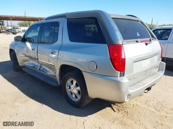 2005 GMC Envoy XUV SLE with VIN 1GKET12S356185669, listed as a IAAI auction lot 40794181 with 221,819 mi miles. Bid and sale history available at carsss.com. Image 3.