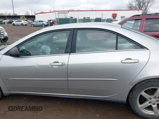 2006 Pontiac G6 6-Cyl with VIN 1G2ZG558464289212, listed as a IAAI auction lot 41994843 with 126,502 mi miles. Bid and sale history available at carsss.com. Image 14.