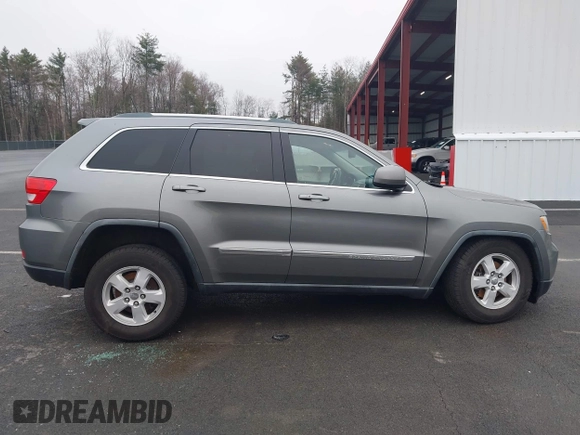 2011 Jeep Grand Cherokee 70th Anniversary with VIN 1J4RR4GG0BC608829, listed as a IAAI auction lot 41960876 with 231,714 mi miles. Bid and sale history available at carsss.com. Image 13.