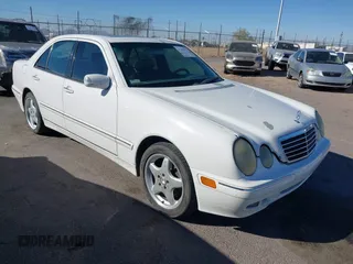 2002 Mercedes-Benz E-Class with VIN WDBJF82J62X076581, listed as a IAAI auction lot 41194976 with 235,453 mi miles. Bid and sale history available at carsss.com. Image 1.