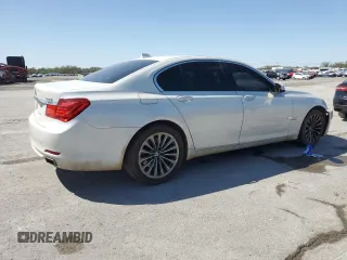 2011 BMW 7 Series 740i with VIN WBAKA4C50BC612878, listed as a Copart auction lot 52035635 with 192,248 mi miles and Salvage Title. Bid and sale history available at carsss.com. Image 3.
