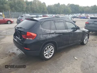 2015 BMW X1 xDrive28i with VIN WBAVL1C58FVY39591, listed as a Copart auction lot 73548684 with 152,569 mi miles and Salvage Title. Bid and sale history available at carsss.com. Image 3.