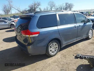 2014 Toyota Sienna XLE with VIN 5TDYK3DC2ES500586, listed as a IAAI auction lot 41995867 with 148,861 mi miles and . Bid and sale history available at DreamBid. Image 4.
