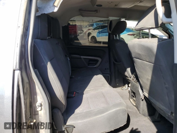2015 Nissan Titan SL with VIN 1N6BA0EC5FN509230, listed as a Copart auction lot 73983574 with 144,288 mi miles and Salvage Title. Bid and sale history available at carsss.com. Image 10.
