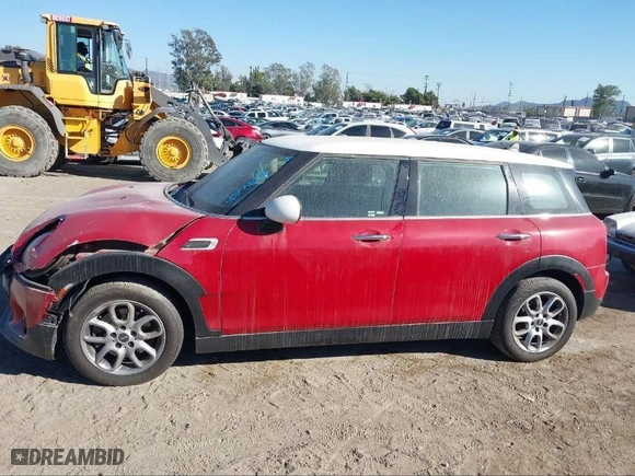 2016 MINI Cooper Clubman with VIN WMWLN5C51G2E30234, listed as a IAAI auction lot 41408299 with 81,895 mi miles. Bid and sale history available at carsss.com. Image 15.