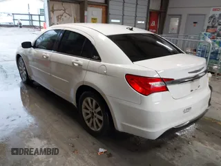 2012 Chrysler 200 LX with VIN 1C3CCBAB0CN222338, listed as a IAAI auction lot 41947154 with 169,737 mi miles and . Bid and sale history available at DreamBid. Image 3.