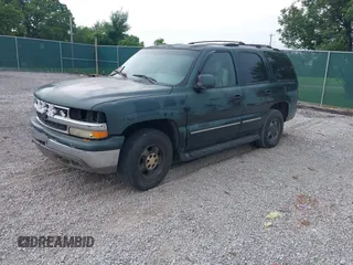 2001 Chevrolet Tahoe LT with VIN 1GNEC13T11R138465, listed as a IAAI auction lot 42447716 with Not provided miles and . Bid and sale history available at DreamBid. Image 2.
