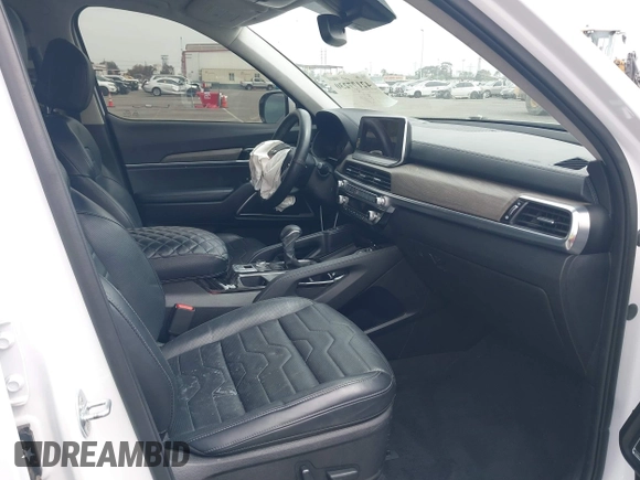2022 Kia Telluride SX z VIN 5XYP5DHC9NG247668, wystawiony jako IAAI lot #42177230 z przebiegiem 37 401 mil mil oraz . Historia ofert i sprzedaży dostępna na DreamBid. Obrazek 5.