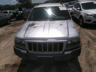 2004 Jeep Grand Cherokee Laredo z VIN 1J4GW48SX4C309998, wystawiony jako IAAI lot #42307167 z przebiegiem 306 912 mil mil oraz . Historia ofert i sprzedaży dostępna na DreamBid. Obrazek 12.