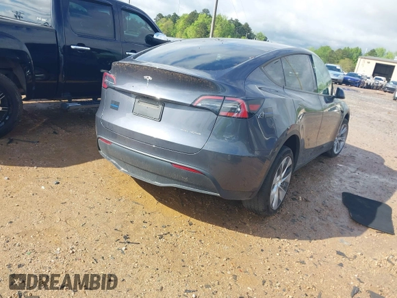 2023 Tesla Model Y Long Range with VIN 7SAYGDEE2PF674286, listed as a IAAI auction lot 42010275 with Not Provided miles and . Bid and sale history available at carsss.com. Image 4.