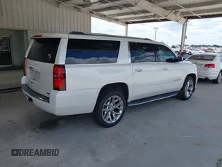 2017 Chevrolet Suburban Premier with VIN 1GNSCJKC5HR248529, listed as a IAAI auction lot 42244402 with 138,365 mi miles and . Bid and sale history available at DreamBid. Image 4.
