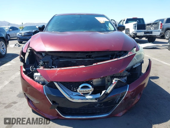 2016 Nissan Maxima SL with VIN 1N4AA6AP0GC426365, listed as a IAAI auction lot 42054030 with 165,557 mi miles and . Bid and sale history available at DreamBid. Image 13.