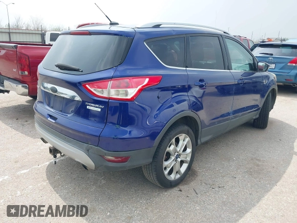 2014 Ford Escape Titanium с VIN 1FMCU0J96EUA61153, выставлен на аукционе IAAI как лот 41807295 с пробегом 159 036 миль миль и . История ставок и продаж доступна на DreamBid. Изображение 4.