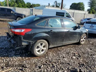 2013 Ford Focus SE z VIN 1FADP3F27DL369634, wystawiony jako Copart lot #61409725 z przebiegiem 122 709 mil mil oraz Szkoda całkowita • Salvage title. Historia ofert i sprzedaży dostępna na DreamBid. Obrazek 3.