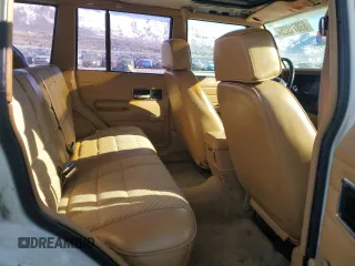 1988 Jeep Cherokee with VIN 1JCMR7813JT058390, listed as a Copart auction lot 89071925 with 2,331,297 mi miles and Clean title. Bid and sale history available at DreamBid. Image 10.
