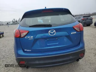 2013 Mazda CX-5 Sport z VIN JM3KE4BE8D0160683, wystawiony jako Copart lot #88324655 z przebiegiem 79 803 mil mil oraz Szkoda całkowita • Salvage title. Historia ofert i sprzedaży dostępna na DreamBid. Obrazek 6.