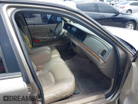 2002 Ford Crown Victoria LX z VIN 2FAFP74W52X112493, wystawiony jako IAAI lot #42197164 z przebiegiem 103 941 mil mil oraz . Historia ofert i sprzedaży dostępna na DreamBid. Obrazek 5.