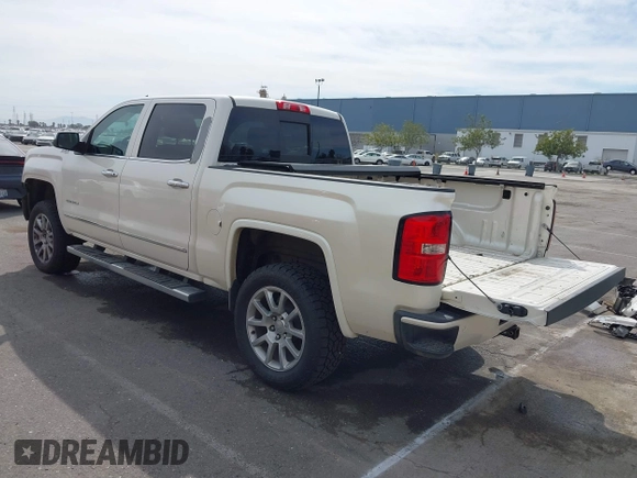 2014 GMC Sierra 1500 Denali z VIN 3GTU2WEJ3EG551266, wystawiony jako IAAI lot #41631624 z przebiegiem 120 214 mil mil oraz . Historia ofert i sprzedaży dostępna na DreamBid. Obrazek 3.