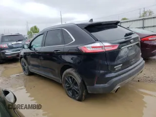 2020 Ford Edge SEL с VIN 2FMPK4J90LBA34676, выставлен на аукционе Copart как лот 55577665 с пробегом 113 214 миль миль и Списание • Salvage title. История ставок и продаж доступна на DreamBid. Изображение 2.