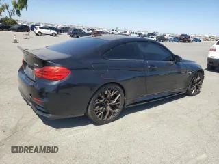 2015 BMW M4 with VIN WBS3R9C50FK333819, listed as a Copart auction lot 61105565 with 168,932 mi miles and Salvage title. Bid and sale history available at DreamBid. Image 3.