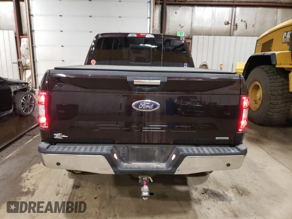 2020 Ford F-150 XL with VIN 1FTEW1EP2LKF10584, listed as a Copart auction lot 60520615 with 64,150 mi miles and Salvage title. Bid and sale history available at DreamBid. Image 6.