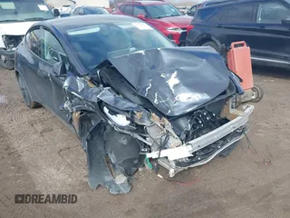 2025 Tesla Model Y Long Range with VIN 7SAYGDED3SF229605, listed as a IAAI auction lot 41726254 with Not Provided miles and . Bid and sale history available at DreamBid. Image 6.