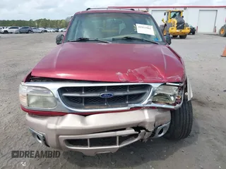 1999 Ford Explorer XLT z VIN 1FMZU35P4XUA38932, wystawiony jako IAAI lot #41953981 z przebiegiem 117 876 mil mil oraz . Historia ofert i sprzedaży dostępna na DreamBid. Obrazek 12.