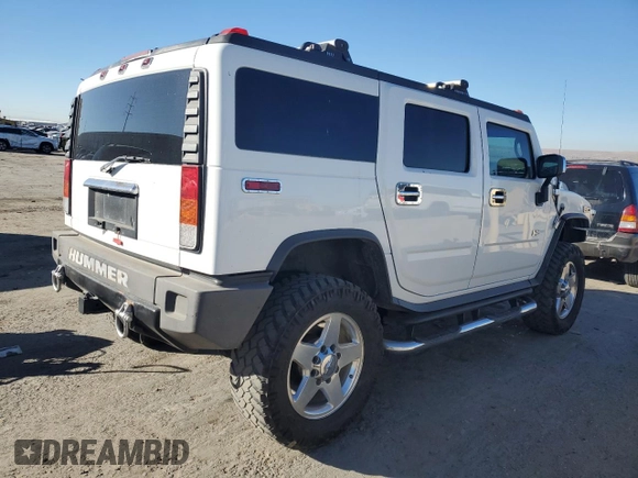 2004 Hummer H2 with VIN 5GRGN23U64H121213, listed as a Copart auction lot 42001135 with 0 mi miles and Salvage Title. Bid and sale history available at carsss.com. Image 3.