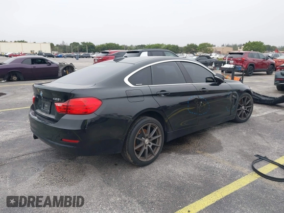 2016 BMW 4 Series 428i xDrive with VIN WBA4C9C58GG136248, listed as a IAAI auction lot 41346270 with 129,464 mi miles and . Bid and sale history available at carsss.com. Image 4.