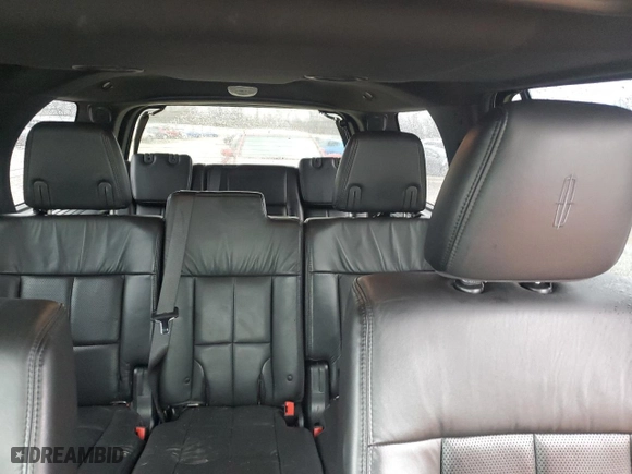2012 Lincoln Navigator with VIN 5LMJJ2J58CEL01087, listed as a Copart auction lot 85877204 with 115,070 mi miles and Salvage Title. Bid and sale history available at carsss.com. Image 10.