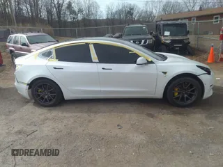 2020 Tesla Model 3 Standard Range Plus with VIN 5YJ3E1EA0LF597839, listed as a IAAI auction lot 41639219 with 49,220 mi miles. Bid and sale history available at carsss.com. Image 14.