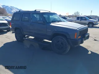 1997 Jeep Cherokee Sport with VIN 1J4FJ68S4VL567490, listed as a IAAI auction lot 41659872 with 404,766 mi miles. Bid and sale history available at carsss.com. Image 1.