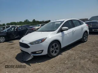 2018 Ford Focus SE with VIN 1FADP3FE8JL241246, listed as a Copart auction lot 60625325 with 82,065 mi miles and Clean title. Bid and sale history available at DreamBid. Image 1.