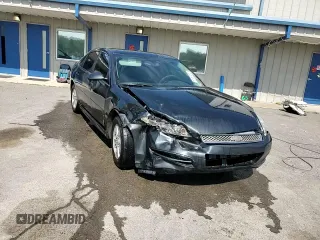 2015 Chevrolet Impala LS with VIN 2G1WA5E38F1165968, listed as a Copart auction lot 61467355 with 143,848 mi miles and Salvage title. Bid and sale history available at DreamBid. Image 13.