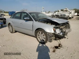 2005 Ford Five Hundred Limited with VIN 1FAFP25165G128086, listed as a Copart auction lot 75576824 with 194,715 mi miles and Salvage Title. Bid and sale history available at carsss.com. Image 4.