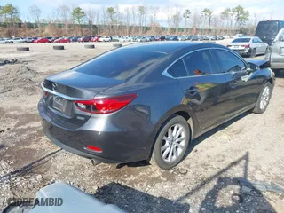 2014 Mazda Mazda6 i Sport with VIN JM1GJ1U66E1133816, listed as a IAAI auction lot 41872811 with 97,035 mi miles. Bid and sale history available at carsss.com. Image 4.