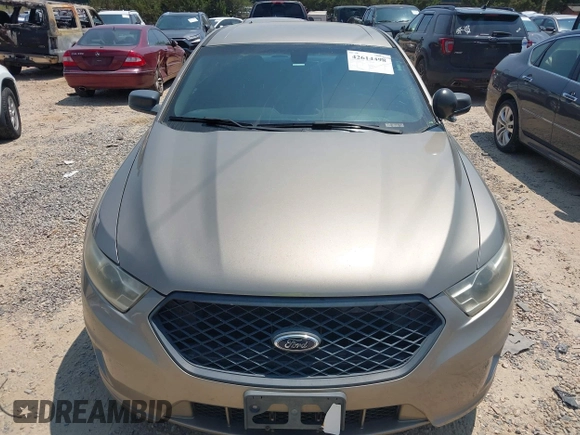 2014 Ford Police Interceptor with VIN 1FAHP2MK4EG131670, listed as a IAAI auction lot 42614498 with 110,254 mi miles and . Bid and sale history available at DreamBid. Image 6.
