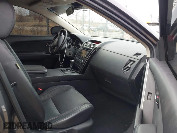 2015 Mazda CX-9 Touring with VIN JM3TB2CA0F0463313, listed as a IAAI auction lot 41822436 with 145,302 mi miles. Bid and sale history available at carsss.com. Image 5.