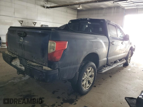 2016 Nissan Titan XD S with VIN 1N6AA1F4XGN509301, listed as a Copart auction lot 42145465 with 199,187 mi miles and Clean Title. Bid and sale history available at carsss.com. Image 3.