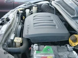 2019 Dodge Grand Caravan GT z VIN 2C4RDGEG1KR671406, wystawiony jako IAAI lot #43370010 z przebiegiem 147 333 mil mil oraz . Historia ofert i sprzedaży dostępna na DreamBid. Obrazek 20.