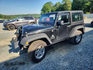 2012 Jeep Wrangler Sport with VIN 1C4AJWAG5CL273292, listed as a Copart auction lot 60135395 with 123,874 mi miles and Salvage title. Bid and sale history available at DreamBid. Image 1.
