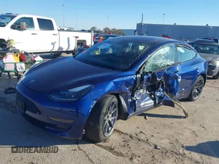 2023 Tesla Model 3 with VIN 5YJ3E1EA6PF505252, listed as a IAAI auction lot 41380172 with 31,141 mi miles and . Bid and sale history available at DreamBid. Image 18.