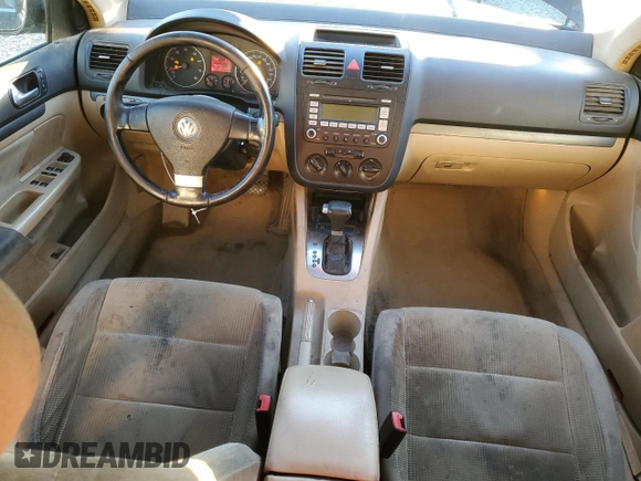 2009 Volkswagen Jetta z VIN 3VWMM31KX9M251901, wystawiony jako Copart lot #84677694 z przebiegiem 299 223 mil mil oraz Szkoda całkowita • Salvage title. Historia ofert i sprzedaży dostępna na DreamBid. Obrazek 8.
