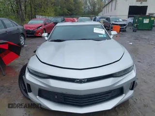 2017 Chevrolet Camaro 1LT z VIN 1G1FB1RXXH0179842, wystawiony jako IAAI lot #42192280 z przebiegiem 89 548 mil mil oraz . Historia ofert i sprzedaży dostępna na DreamBid. Obrazek 12.