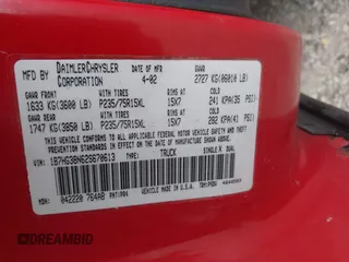 2002 Dodge Dakota Sport with VIN 1B7HG38N62S670613, listed as a IAAI auction lot 42133366 with 156,977 mi miles and . Bid and sale history available at carsss.com. Image 9.