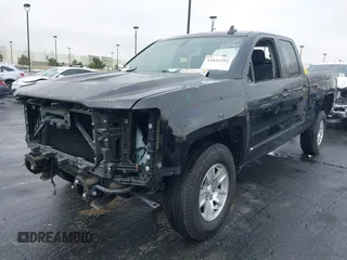 2017 Chevrolet Silverado 1500 LT with VIN 1GCRCREC5HZ113150, listed as a IAAI auction lot 41826582 with 50,565 mi miles and . Bid and sale history available at DreamBid. Image 2.