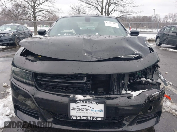 2022 Dodge Charger SXT with VIN 2C3CDXBG0NH157720, listed as a IAAI auction lot 41559731 with 21,062 mi miles and . Bid and sale history available at carsss.com. Image 12.