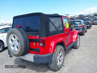 2014 Jeep Wrangler Sahara with VIN 1C4AJWBG0EL109773, listed as a IAAI auction lot 41678412 with 12,264 mi miles and . Bid and sale history available at DreamBid. Image 4.
